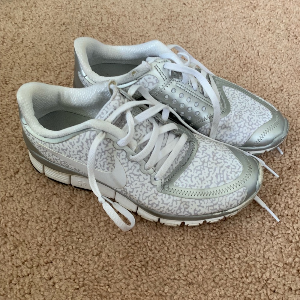 Nike white & gray cheetah tennis shoes. Size 7.5